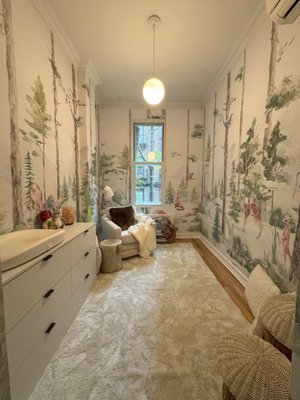 Wallpaper for a nursery - Installing wallpaper for all the walls in a nursery as a whole mural. Wallpaper for a nursery - Installing wallpaper for all the walls in a nursery as a whole mural.