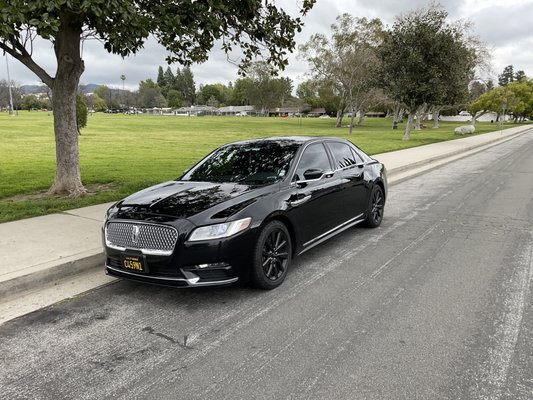 2020 Lincoln continental - Its a 4 door sedan that also has bottle of water, charger, magazine, usb port, iPad with Tv service only