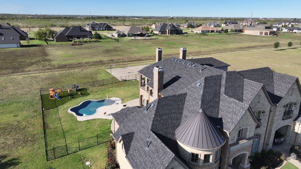 Multi Story Roofs - Multi elevation and multi story roof replacements in shingle and metal Multi Story Roofs - Multi elevation and multi story roof replacements in shingle and metal
