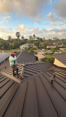 Palmetto Bay Miami Metal Roof: Sleek, Durable, and Ready for Florida Weather - Just completed: a beautiful new metal roof for this residence in Palmetto Bay, Miami! We installed a sleek, long-lasting metal roofing system designed to provide superior protection from Florida's harsh weather and keep the home comfortable all year round. Our team delivered expert installation and flawless results. Looking to upgrade your Palmetto Bay home with a metal roof? Contact us today for a Free consultation! Palmetto Bay Miami Metal Roof: Sleek, Durable, and Ready for Florida Weather - Just completed: a beautiful new metal roof for this residence in Palmetto Bay, Miami! We installed a sleek, long-lasting metal roofing system designed to provide superior protection from Florida's harsh weather and keep the home comfortable all year round. Our team delivered expert installation and flawless results. Looking to upgrade your Palmetto Bay home with a metal roof? Contact us today for a Free consultation!