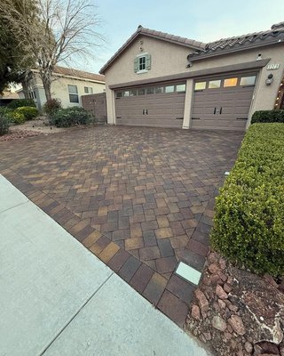 Paver Cleaning, Restoration, and Sealing - This Anthem driveway project involved a full paver cleaning, sealer removal, and resealing. The existing sealer had broken down over time, leaving the surface faded and uneven.
We started by stripping the old sealer to remove buildup and restore the surface. From there, we completed a deep cleaning to properly prepare the pavers for sealing.
The pavers were then sealed with a professional-grade water-based urethane. This type of sealer enhances the natural color with a clean wet look while providing long-term protection without the peeling or buildup issues common with older sealers. Paver Cleaning, Restoration, and Sealing - This Anthem driveway project involved a full paver cleaning, sealer removal, and resealing. The existing sealer had broken down over time, leaving the surface faded and uneven.
We started by stripping the old sealer to remove buildup and restore the surface. From there, we completed a deep cleaning to properly prepare the pavers for sealing.
The pavers were then sealed with a professional-grade water-based urethane. This type of sealer enhances the natural color with a clean wet look while providing long-term protection without the peeling or buildup issues common with older sealers.