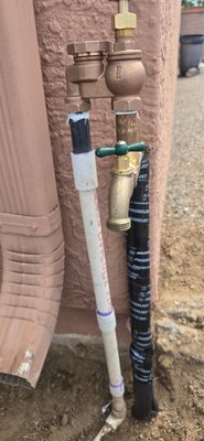 anti siphon for irrigation - The homeowner contacted us after discovering their backyard had flooded due to a failed outdoor water line. Upon arrival, we quickly assessed the situation and were able to restore water service to the home the very same day. The existing plumbing consisted of a mixture of old copper, PVC, and a worn-out anti-siphon valve and hose bib, all of which showed signs of deterioration and improper installation.

To ensure a long-term and reliable repair, we removed all outdated materials and replaced them with new, high-quality piping and fittings. A new hose bib was installed and securely mounted to the wall to prevent movement or future leaks. We also installed a new anti-siphon assembly to bring the system up to current code and to protect the home’s drinking water supply from potential backflow.

Finally, all exposed piping was properly insulated to safeguard against weather conditions, reduce wear from UV exposure, and provide additional protection against temperature fluctuations. This repair not only restored service but also improved the overall durability and safety of the homeowner’s outdoor water system.