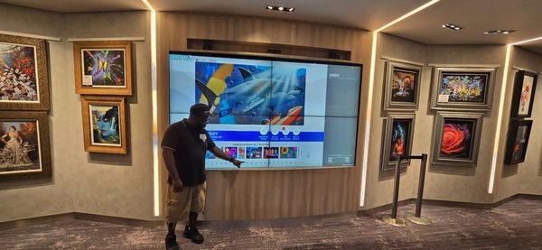 Quad touchscreen monitor Installation. - EJS Installations was contracted to enhance the digital experience aboard a Royal Caribbean ship by installing four high-resolution touchscreen monitors. These interactive screens were strategically placed to provide guests with seamless access to important information and services. Quad touchscreen monitor Installation. - EJS Installations was contracted to enhance the digital experience aboard a Royal Caribbean ship by installing four high-resolution touchscreen monitors. These interactive screens were strategically placed to provide guests with seamless access to important information and services.