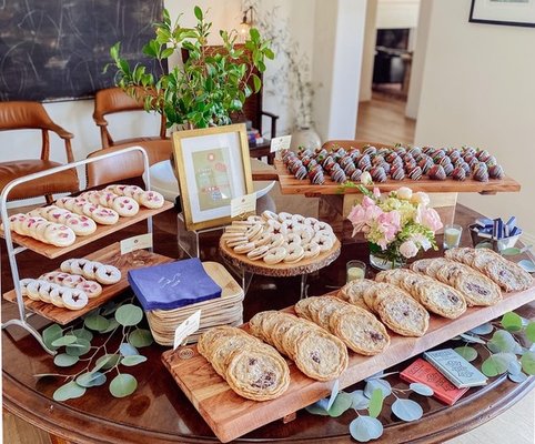 Dessert Table - A beautiful grazing table filled with delicious sweet nibbles from various cookies to chocolate covered strawberries. Dessert Table - A beautiful grazing table filled with delicious sweet nibbles from various cookies to chocolate covered strawberries.