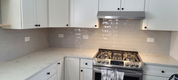 Brand New Kitchen's Backsplash - Brand new kitchen's backsplash tile installation and grout installation using a 2x6" glazed light grey ceramic tile. Brand New Kitchen's Backsplash - Brand new kitchen's backsplash tile installation and grout installation using a 2x6" glazed light grey ceramic tile.