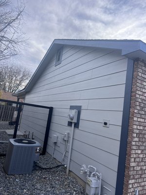 Exterior Paint of home Loveland Colorado - This house got a fresh paint job after the siding of the home was removed and replaced with brand new siding. This Project took us approximately one week to complete.