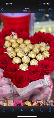Forever roses in a heart box with sweets - These are roses that last forever. They are in a hat shaped heart box with ferraro roche.