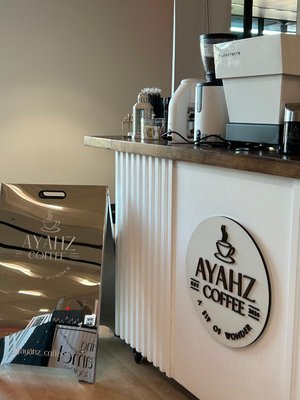 Specialty Coffee & Matcha Pop-Up - An indoor event setup showcasing our Ayahz Coffee mobile bar. Guests enjoyed specialty coffee, matcha, and handcrafted drinks served from our modern, polished setup — perfect for markets, weddings, and private events.