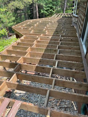 Redeck - Removed old decking on an existing deck and installed new composite decking Redeck - Removed old decking on an existing deck and installed new composite decking