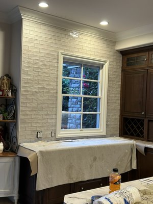 Last Kitchen Backsplash of 2024 - This kitchen backsplash was first planned to be a simple brick pattern, but then the client decided to do a framed herringbone pattern centered to the stove. This turned out looking really nice. Client was happy with the results. Last Kitchen Backsplash of 2024 - This kitchen backsplash was first planned to be a simple brick pattern, but then the client decided to do a framed herringbone pattern centered to the stove. This turned out looking really nice. Client was happy with the results.