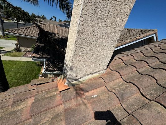 Tile roof repair - This is an older tile roof that was in need of some repairs. There was one section that needed to be replaced, broken tile in other areas, and renewal of all sealants. Tile roof repair - This is an older tile roof that was in need of some repairs. There was one section that needed to be replaced, broken tile in other areas, and renewal of all sealants.