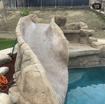 Slide resurfacing - We took an old slide, sanded smooth to remove all the old coating, added a few colors, and applied new clear coat. ￼￼