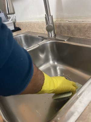 Kitchen Sink and Faucet Routine Cleaning - This routine maintenance cleaning was done in a client’s kitchen during a visit and we added some glitter to the kitchen afterwards