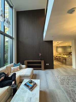 Custom Accent Wall Installation - Custom accent wall installation on a high ceiling, requiring detailed layout, precise alignment, and professional finish work to create a modern focal point. Custom Accent Wall Installation - Custom accent wall installation on a high ceiling, requiring detailed layout, precise alignment, and professional finish work to create a modern focal point.