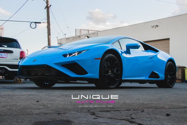 2023 Lamborghini Huracan EVO XPEL (PPF and Ceramic Pro) - This unique metallic blue paint job needed some protection! Covered with a Full Front Custom Installation for a seamless look, it’s ready to hit the track! Protected with XPEL and Ceramic Pro there will be no more worries for rock chips or environmental damage. With the Ceramic Coating, taking care of this exotic car will be a piece of cake! No more waxing or polishing, ensuring that high gloss finish of this metallic paint.