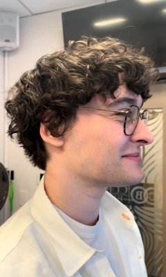 Embrace the Curls - Expert Cuts for Men with Natural Curls.