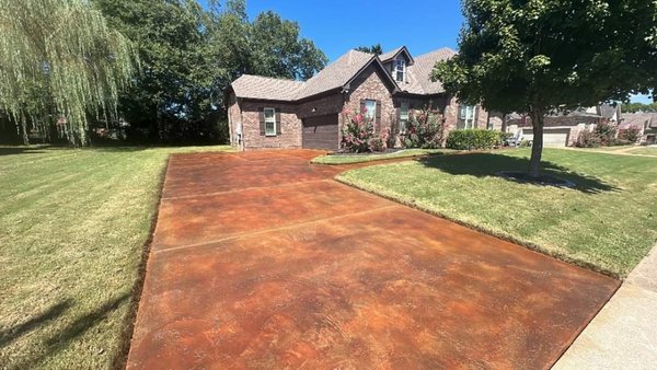Foundation Repair in Smyrna, TN - We did driveway repair on this home's driveway and stained the driveway this beautiful warm brown color. Foundation Repair in Smyrna, TN - We did driveway repair on this home's driveway and stained the driveway this beautiful warm brown color.