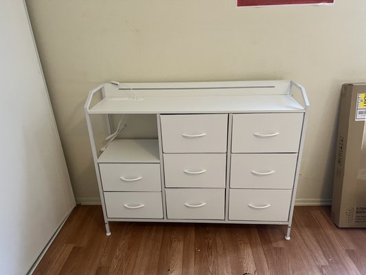 2 Dressers , cabinet - Assembled a dresser with multiple drawers.
Drawers aligned, unit leveled, and securely assembled.
Clean and professional furniture assembly.