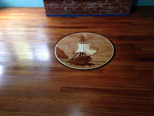ISF Brazilian cherry floor - Install, sand & finish approximately 600 SF of Brazilian cherry with an inserted medallion. ISF Brazilian cherry floor - Install, sand & finish approximately 600 SF of Brazilian cherry with an inserted medallion.