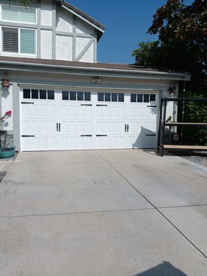 Gorgeous new door and decorative hardware - Shopping for a new garage door? We make it easy. From modern to carriage styles, insulated options, and smart-tech upgrades, we’ll help you find the right fit for your home and budget. Contact us for fast, professional installation. Gorgeous new door and decorative hardware - Shopping for a new garage door? We make it easy. From modern to carriage styles, insulated options, and smart-tech upgrades, we’ll help you find the right fit for your home and budget. Contact us for fast, professional installation.