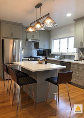 Kitchen remodeling - A great transformation from a very dated kitchen to a modern look with better functionality and better use of the space. Larger island with great combination of wood, gray and white tones brought back the warmth that this kitchen needed. Kitchen remodeling - A great transformation from a very dated kitchen to a modern look with better functionality and better use of the space. Larger island with great combination of wood, gray and white tones brought back the warmth that this kitchen needed.