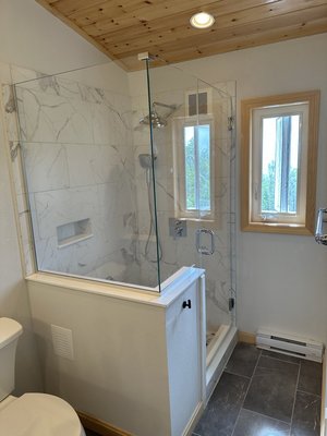 Master Bed/Bath Remodel - A remodel in Bartlett, New Hampshire of an office & guest room into a master bed & bath. Designed in CAD, interior walls demolished, new framing for bathroom and two closets, bathroom with tiled floor and shower, while enlarging the bedroom substantially. Handled all aspects of the job including subcontractors. Master Bed/Bath Remodel - A remodel in Bartlett, New Hampshire of an office & guest room into a master bed & bath. Designed in CAD, interior walls demolished, new framing for bathroom and two closets, bathroom with tiled floor and shower, while enlarging the bedroom substantially. Handled all aspects of the job including subcontractors.