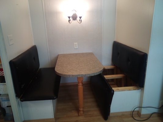 Sitting room remodel - this remodel was in use , so the customer wanted cabinets for storage installed, and then he had painted the walls late