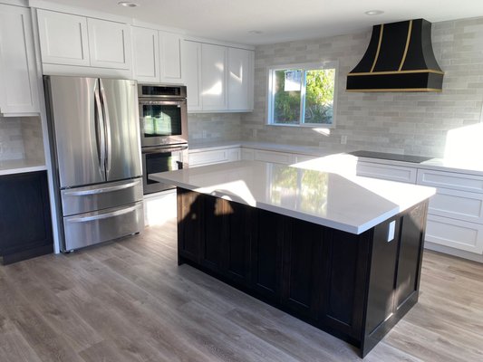 Kitchen - Knocked down some walls to create open space kitchen with dine-in island Kitchen - Knocked down some walls to create open space kitchen with dine-in island
