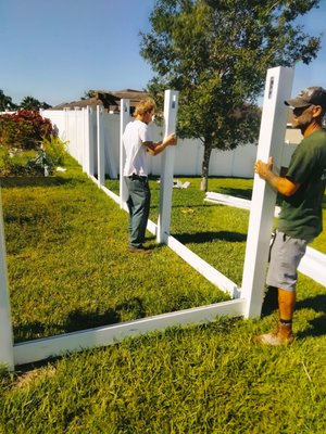White Vinyl Fence Install - Extending a 6' white vinyl fence sideline and return White Vinyl Fence Install - Extending a 6' white vinyl fence sideline and return