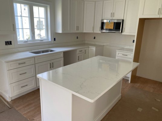 Quartz - Misterio Pental Quartz for Kitchen & Calcutta Gold Silestone for Vanities - Beautiful quartz counters installed on kitchen and all vanities of this home. Quartz - Misterio Pental Quartz for Kitchen & Calcutta Gold Silestone for Vanities - Beautiful quartz counters installed on kitchen and all vanities of this home.