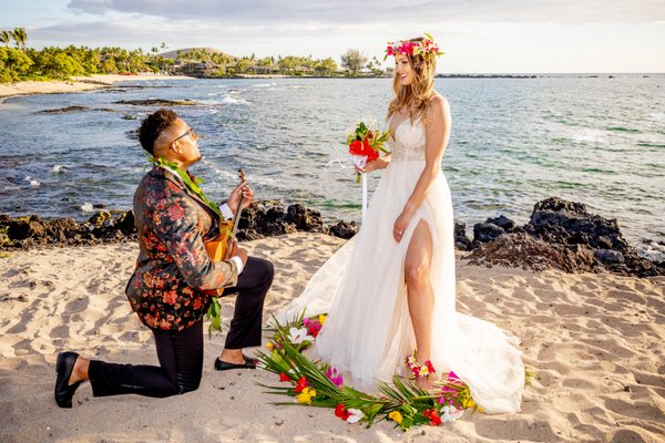 Hawaii destination weddings on the Big Island - Let Aloha Beach Weddings plan your Hawaii elopement with a dream wedding on a picture-perfect tropical beach.
Packages range from minimalist to all-inclusive beach wedding ceremonies and vow renewals. Our Hawaii beach weddings incorporate elements of Hawaiian tradition such as conch shell blowing, lei exchange, sand unity ceremony and more, with a backdrop of hula dancing and ukulele music playing. Our aim is effortless wedding planning on your part with budget-friendly and affordable options to create a unique and memorable Hawaii wedding experience. All our Hawaii destination wedding packages include a wedding officiant, 2 wedding flower leis, lei exchange ceremony, conch shell blowing, Hawaii wedding beach permit, Hawaiian themed certificate, submission of paperwork to the State of Hawaii. Upgrade packages include professional photography and cinematography, elaborate tropical floral arrangements and traditional Hawaiian live music. We are professional wedding planners on a mission to make your dream wedding a reality! Hawaii destination weddings on the Big Island - Let Aloha Beach Weddings plan your Hawaii elopement with a dream wedding on a picture-perfect tropical beach.
Packages range from minimalist to all-inclusive beach wedding ceremonies and vow renewals. Our Hawaii beach weddings incorporate elements of Hawaiian tradition such as conch shell blowing, lei exchange, sand unity ceremony and more, with a backdrop of hula dancing and ukulele music playing. Our aim is effortless wedding planning on your part with budget-friendly and affordable options to create a unique and memorable Hawaii wedding experience. All our Hawaii destination wedding packages include a wedding officiant, 2 wedding flower leis, lei exchange ceremony, conch shell blowing, Hawaii wedding beach permit, Hawaiian themed certificate, submission of paperwork to the State of Hawaii. Upgrade packages include professional photography and cinematography, elaborate tropical floral arrangements and traditional Hawaiian live music. We are professional wedding planners on a mission to make your dream wedding a reality!