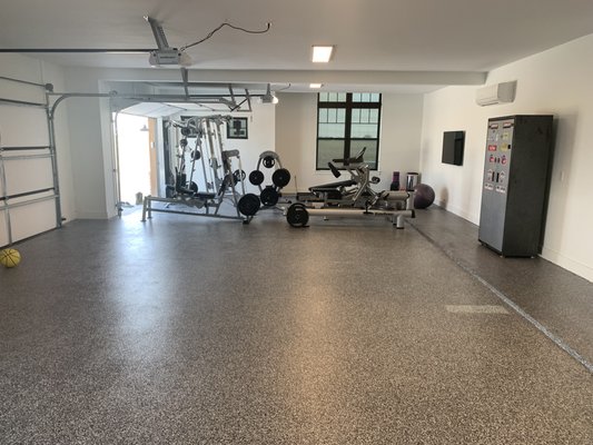 Garage Epoxy Installation - Long lasting, low maintenance solution to your concrete garage floors.