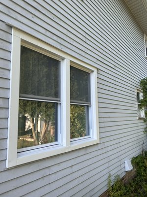 Two Vinyl Window Replacements with Custom Aluminum Trim - Removed the old windows, reinforced and prepared the existing frames, installed two new vinyl windows, and finished the exterior with custom-fabricated aluminum trim for a clean, weather-resistant finish.