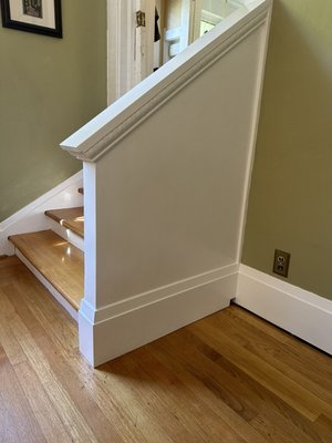 Added new stairway wall and handrail to match older home - The old staircase was incomplete and dangerous. The owner wanted a sturdy handrail that was attractive and that would look original to the house