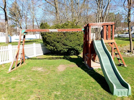 Swing Set Removal - These are before and after photos of a recent swing set removal that we did in Milton MA. We help homeowners add more space to their backyards by removing large items like swing sets, sheds and trampolines that are no longer being used.

Let us know if you would like a quote on removing large outdoor structures at your home.