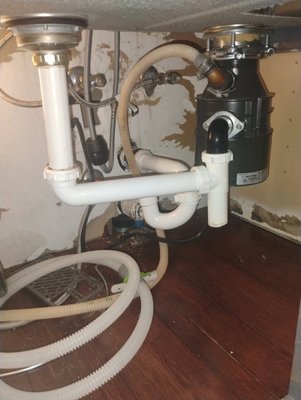 Kitchen Sink Pipe Repair - Old pipes were leaking, we replaced with new pvc pipe.