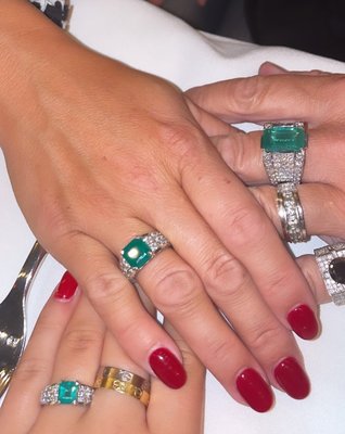 We Are A One Stop Shop For All Things Fine Jewelry - This customer wanted emerald rings for the whole family last Christmas. First I sent him pictures of gemstones available and the prices. If they look interesting to you I can bring them for you to see them in person. The customer found ring styles on line that he liked that could be created to fit the chosen gemstones. You then see the computer pictures and if they look good I will order the mold for you to see before they go to casting and perfectly finished. This sounds like a long process but Integrity Jewelers can go from start to finish in 10 days. 
I included the picture of the 4 Ct black diamond ring which his wife had purchased for him for his birthday and you can see on his hand in the Christmas dinner picture.