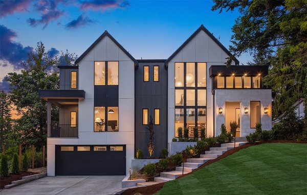 Bellevue Eastgate Elegance Exterior Transformation - We had the privilege of working on the Eastgate community’s marquee residence, crafted by Baluco Homes. Our team at PNW Exterior Solutions undertook a comprehensive siding and exterior renovation that truly enhances this exceptional property. The striking architecture and expansive mountain view lot were complemented by our meticulous work, elevating the home’s already impressive curb appeal.

From the precision siding installation to the flawless finish, we ensured every detail reflected the home’s sophisticated design and architectural prowess. This transformation seamlessly integrates with the residence's vibrant living spaces and elegant features, contributing to its standout presence in the Bellevue area. The project underscores our commitment to excellence and our ability to enhance luxury properties with style and precision.