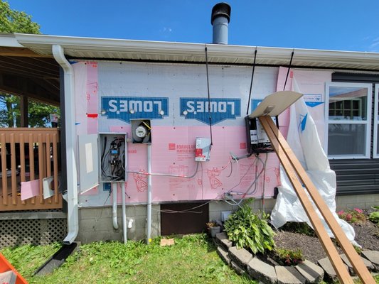 Siding replacement - The customer needed to replace his outdated siding. This meant that the electrical meter, electrical service, and solar equipment had to be removed and reinstalled.
