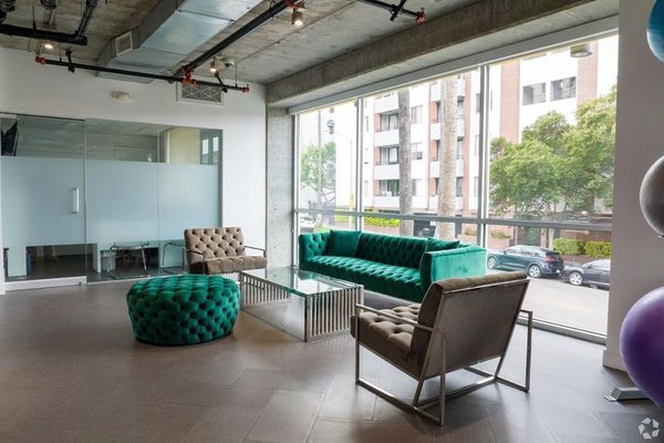 Meet me at 6th and Kenmore - Enjoy modern amenities including a fitness center, rooftop lounge, convenient parking garage with EV charging, and a cozy resident lounge—everything you need for comfortable, contemporary living.