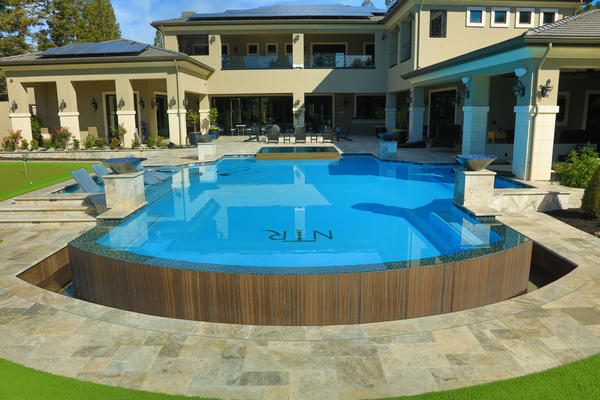 New Pool & Spa - New Pool & Spa with Infinity Edge, Fire/Water Bowls, Upgraded Tile, and Coping. New Pool & Spa - New Pool & Spa with Infinity Edge, Fire/Water Bowls, Upgraded Tile, and Coping.
