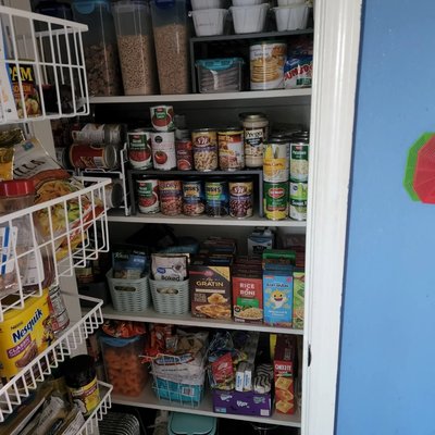 kicthen pantry - This is a kicthen pantry in need of some serious help. We pulled everything out and catorgized it to make it functional. The toddler snack are where the toddler can teach them easily