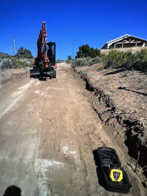 Excavation services - Cutting in a road on a mountain side