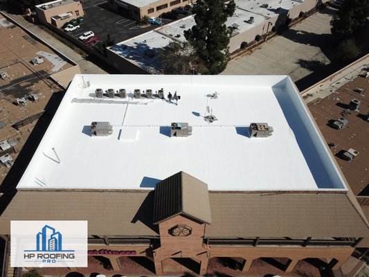 Roofing for Planet Fitness - The property management company wanted to install a new roofing system on the building that was occupied by Planet Fitness. However, they needed to do so without impacting the business operations of their tenants. HP Roofing Pro suggested a non-evasive commercial cool roofing system application. The application would have little to no disruption to the building tenants as the application would only take approximately 5 workings days and would not require any demolition on the existing roof. Roofing for Planet Fitness - The property management company wanted to install a new roofing system on the building that was occupied by Planet Fitness. However, they needed to do so without impacting the business operations of their tenants. HP Roofing Pro suggested a non-evasive commercial cool roofing system application. The application would have little to no disruption to the building tenants as the application would only take approximately 5 workings days and would not require any demolition on the existing roof.