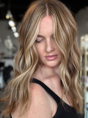 BEFORE & AFTER BLONDING - This client came in wanting a minimal change to break up her base & brighten her up. We did a partial blonding, root melt & gloss!