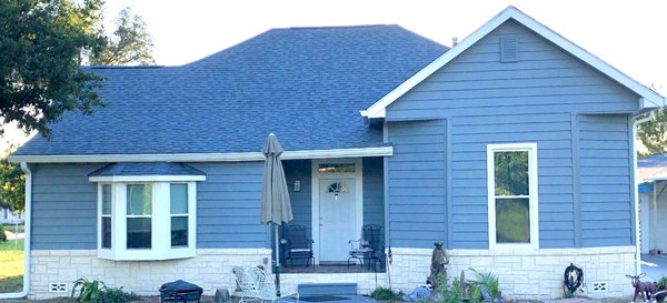 Full Window World Transformation - Our team gave this home a complete makeover by replacing the weathered white siding with our premium blue siding. Brickstone was added to the base of the home and wraps around. New energy-efficient windows were also installed to complete this home's renovation! Full Window World Transformation - Our team gave this home a complete makeover by replacing the weathered white siding with our premium blue siding. Brickstone was added to the base of the home and wraps around. New energy-efficient windows were also installed to complete this home's renovation!