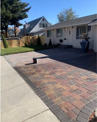 Driveway Projects - Our driveway installation process begins with a thorough consultation to understand your needs and preferences. We start by preparing the site, which involves removing existing materials, leveling the ground, and ensuring proper drainage to prevent future issues. Next, we set the forms to define the driveway's shape and pour high-quality concrete, carefully smoothing and finishing the surface for a clean, polished look. After allowing the concrete to cure properly, we perform any final touches, like sealing, to enhance durability and appearance. Throughout the process, our team prioritizes clear communication, quality craftsmanship, and a commitment to delivering a driveway that enhances your home’s curb appeal and functionality. Driveway Projects - Our driveway installation process begins with a thorough consultation to understand your needs and preferences. We start by preparing the site, which involves removing existing materials, leveling the ground, and ensuring proper drainage to prevent future issues. Next, we set the forms to define the driveway's shape and pour high-quality concrete, carefully smoothing and finishing the surface for a clean, polished look. After allowing the concrete to cure properly, we perform any final touches, like sealing, to enhance durability and appearance. Throughout the process, our team prioritizes clear communication, quality craftsmanship, and a commitment to delivering a driveway that enhances your home’s curb appeal and functionality.
