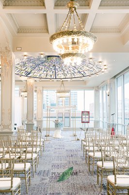 Hannah & Stefan's Wedding - Hannah and Stefan celebrated their ceremony and reception in our Wisteria Room. In between the two, guests mingled through the museum galleries for cocktail hour. Photography by Peacemade Photography. Hannah & Stefan's Wedding - Hannah and Stefan celebrated their ceremony and reception in our Wisteria Room. In between the two, guests mingled through the museum galleries for cocktail hour. Photography by Peacemade Photography.