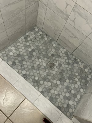 Adding marble to shower floor - Install shower floor with a new drain Adding marble to shower floor - Install shower floor with a new drain