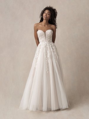 Bridal Gowns By Allure - At Silhouette Bridal, we're proud to offer the timeless elegance of Allure Bridals—a designer known for creating breathtaking wedding gowns that blend classic romance with modern sophistication. Every gown is thoughtfully crafted with luxurious fabrics, intricate lace, delicate beading, and flattering silhouettes designed to make every bride feel confident and beautiful.
Whether you're dreaming of a sleek, contemporary look, a dramatic ball gown, or a romantic fit-and-flare design, the Allure Bridals collection offers styles to suit every vision and bridal personality. Renowned for exceptional craftsmanship and attention to detail, these gowns are designed to create unforgettable moments from your walk down the aisle to your last dance.
Visit Silhouette Bridal to explore our curated selection of Allure Bridals gowns and enjoy a personalized, luxury bridal experience as you find the dress you've always imagined. Bridal Gowns By Allure - At Silhouette Bridal, we're proud to offer the timeless elegance of Allure Bridals—a designer known for creating breathtaking wedding gowns that blend classic romance with modern sophistication. Every gown is thoughtfully crafted with luxurious fabrics, intricate lace, delicate beading, and flattering silhouettes designed to make every bride feel confident and beautiful.
Whether you're dreaming of a sleek, contemporary look, a dramatic ball gown, or a romantic fit-and-flare design, the Allure Bridals collection offers styles to suit every vision and bridal personality. Renowned for exceptional craftsmanship and attention to detail, these gowns are designed to create unforgettable moments from your walk down the aisle to your last dance.
Visit Silhouette Bridal to explore our curated selection of Allure Bridals gowns and enjoy a personalized, luxury bridal experience as you find the dress you've always imagined.